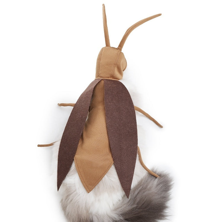 a stuffed toy bug with a fluffy tail
