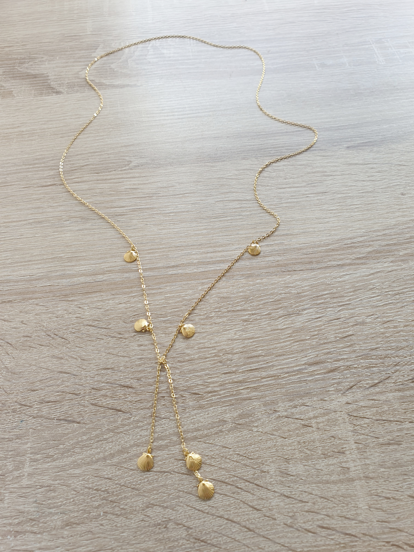 Gold seashell wrap necklace