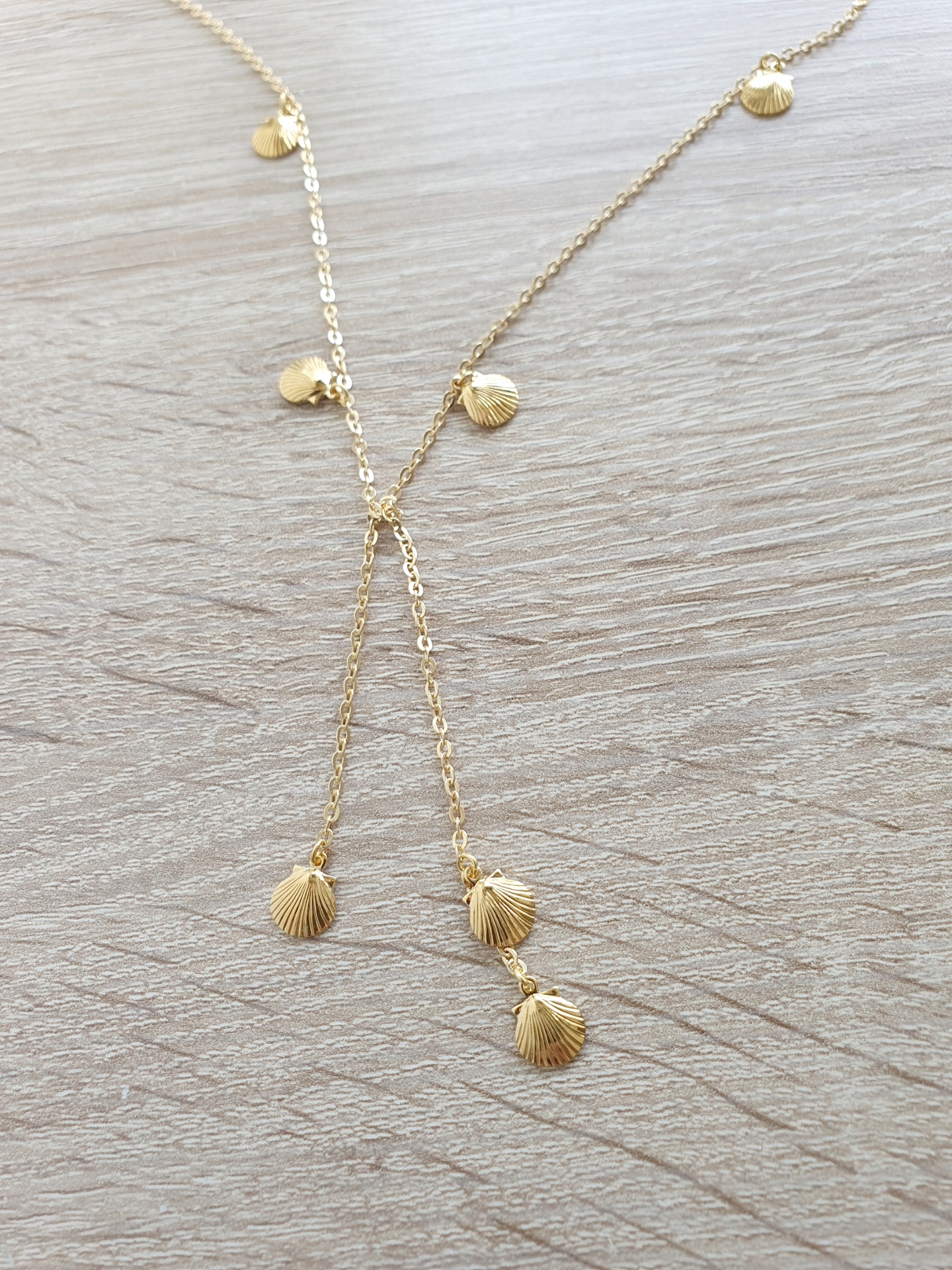 Gold seashell wrap necklace