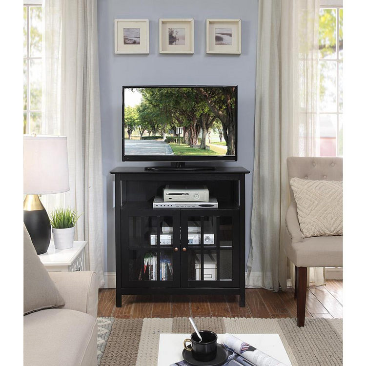 a tv on a stand in a living room