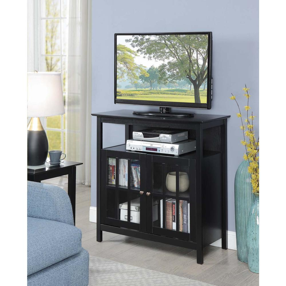 a tv on a shelf in a room
