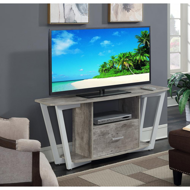 a tv on a stand in a room