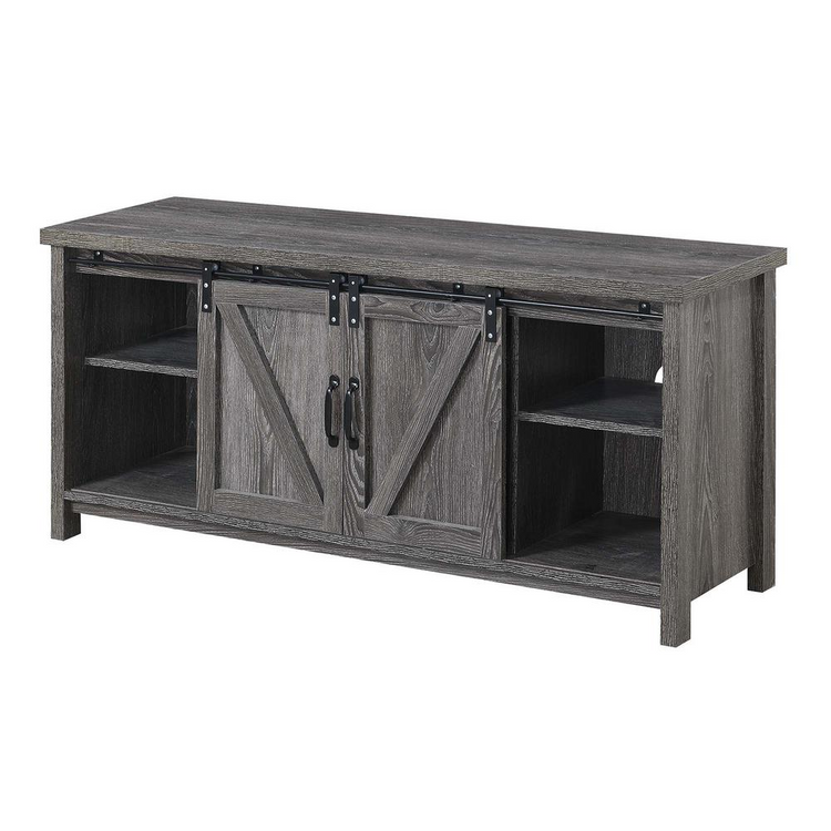 a wooden entertainment center with sliding doors