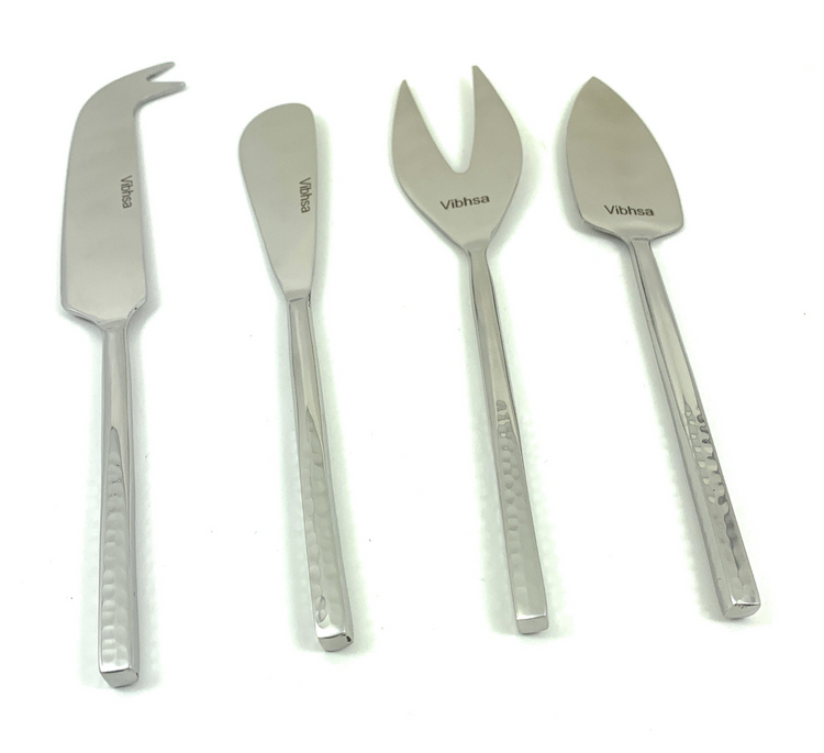 a group of silver utensils