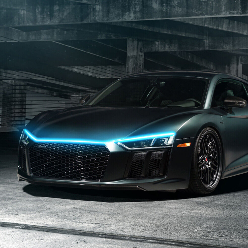 a black sports car with blue lights