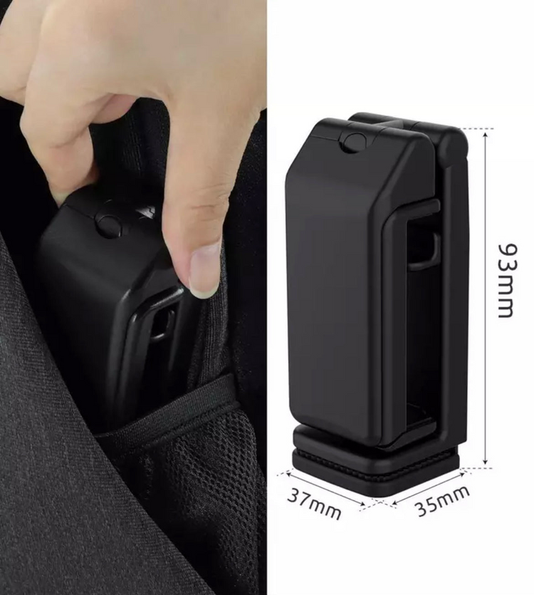 a hand holding a device in a pocket