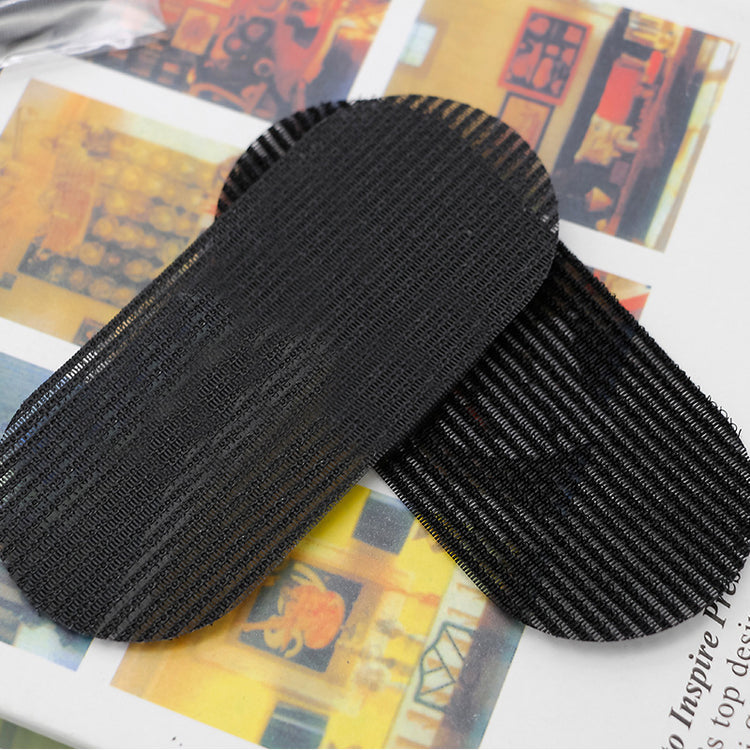 a pair of black velcro strips