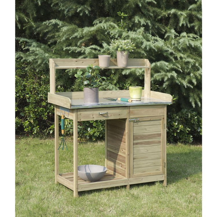 a wooden garden table with potted plants on top