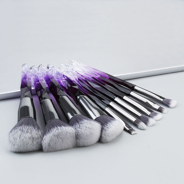 a group of makeup brushes