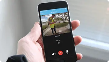 a hand holding a phone