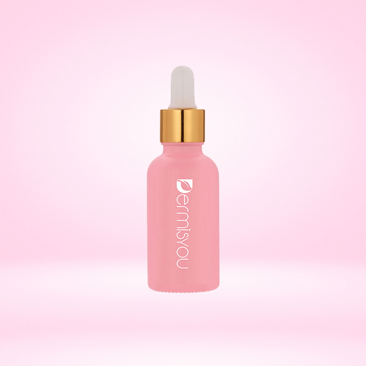 a pink bottle with a dropper