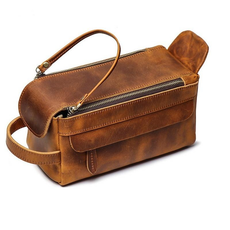 a brown leather bag with a handle