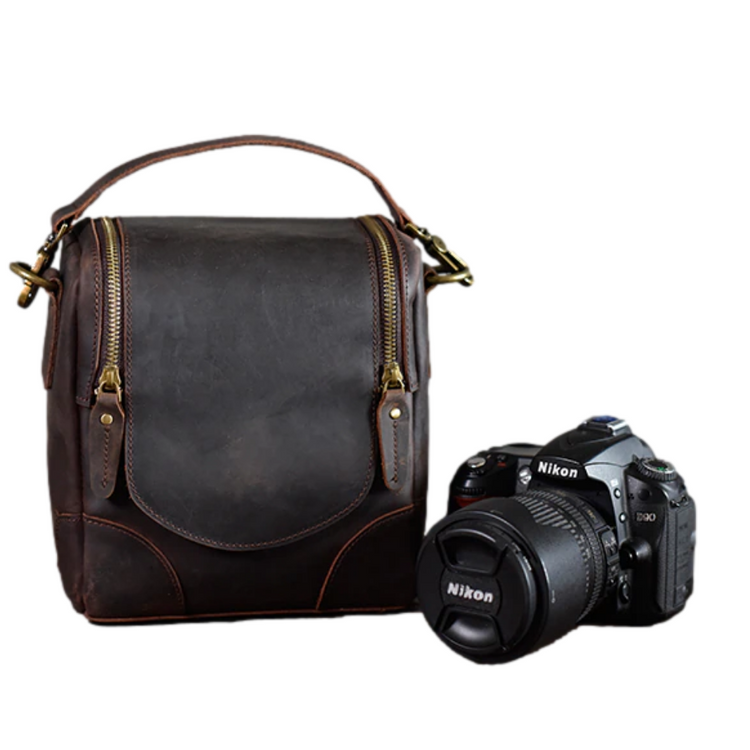 a camera and bag on a white background