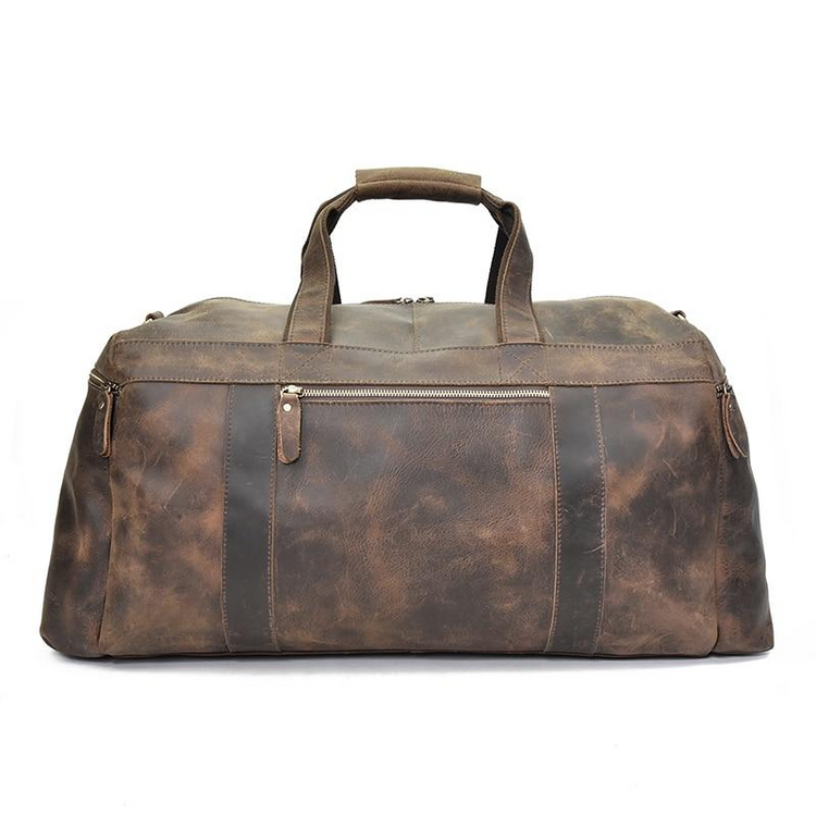 a brown leather duffel bag