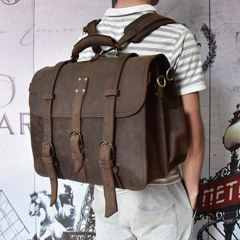 a person with a brown bag