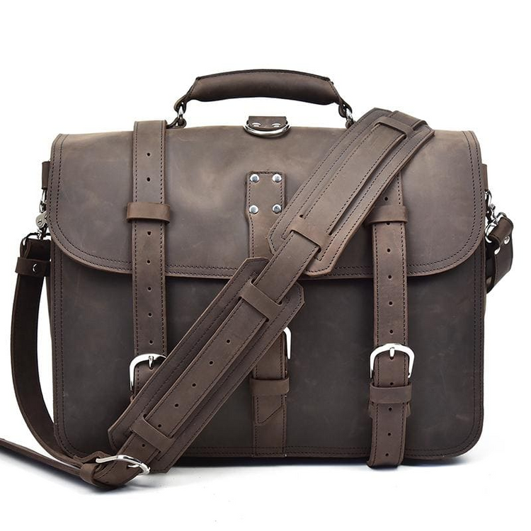 a brown leather briefcase with straps