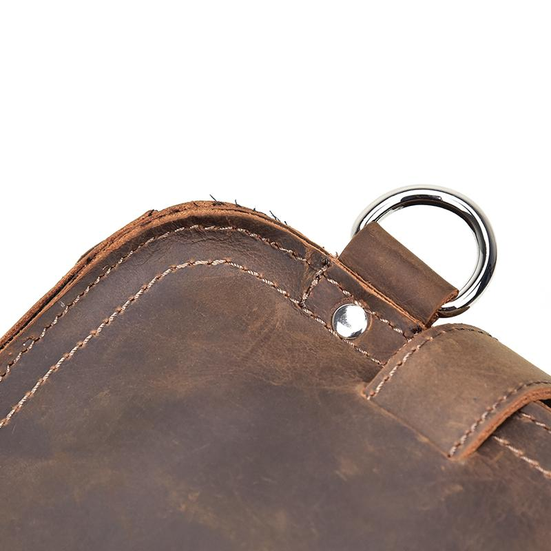 a close up of a leather purse