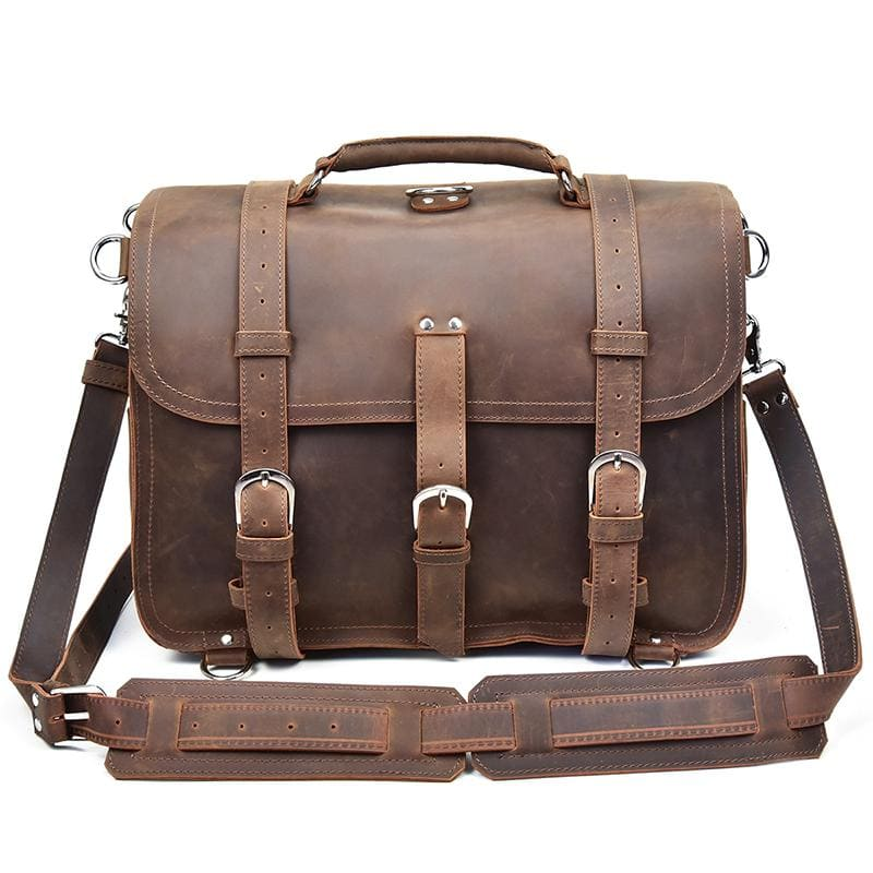 a brown leather bag with straps