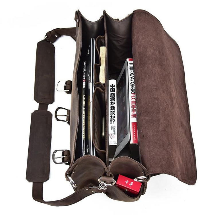 a brown bag with a few objects inside