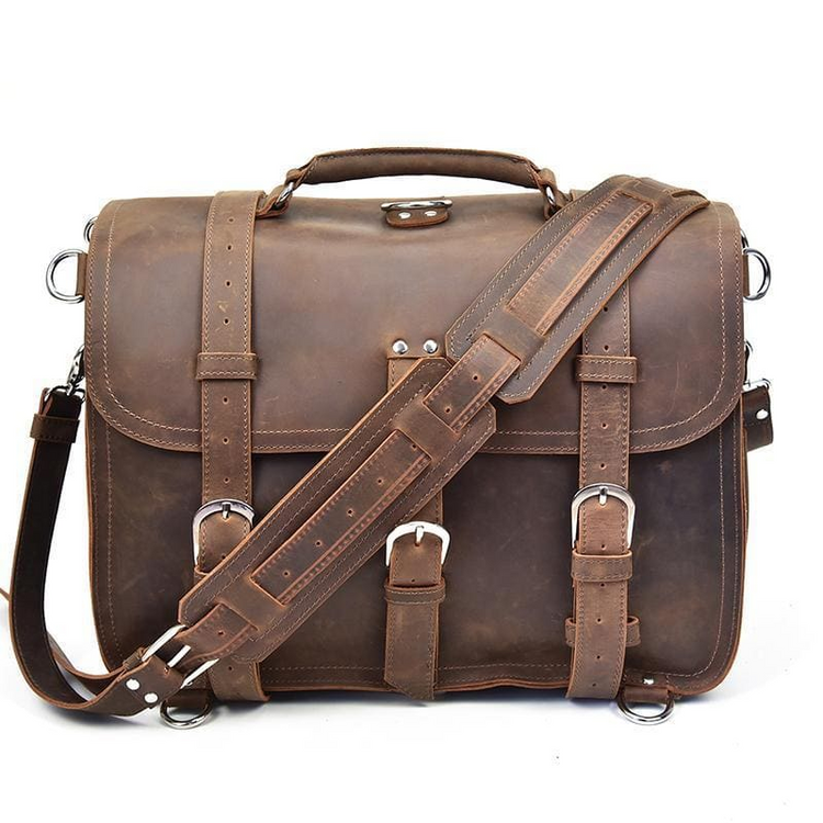 a brown leather briefcase with straps