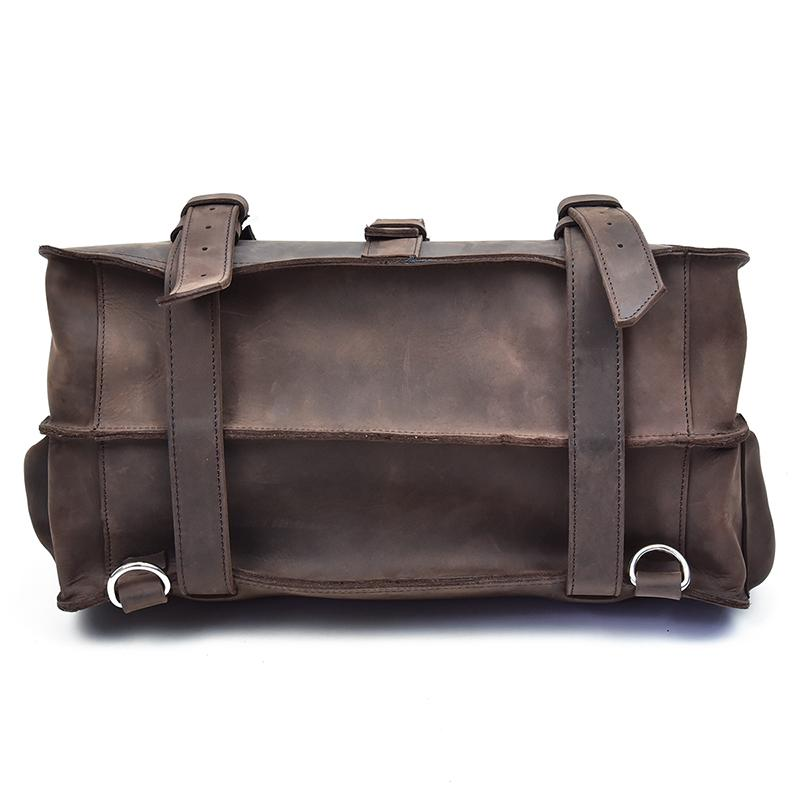 a brown leather bag with straps