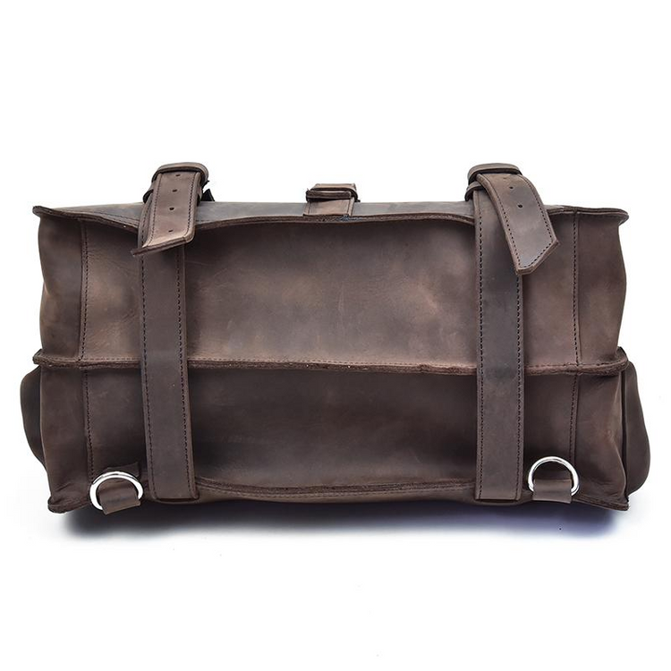 a brown leather bag with straps