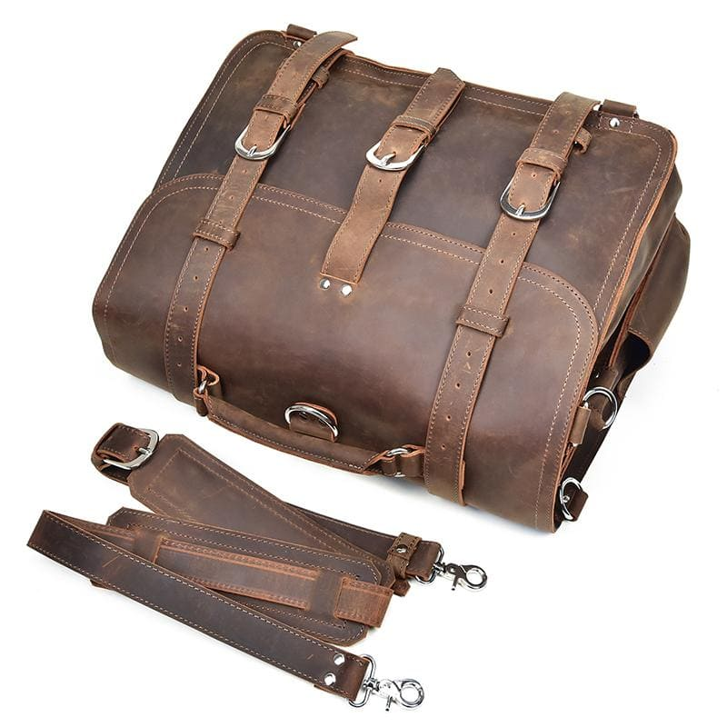 a brown leather bag with straps
