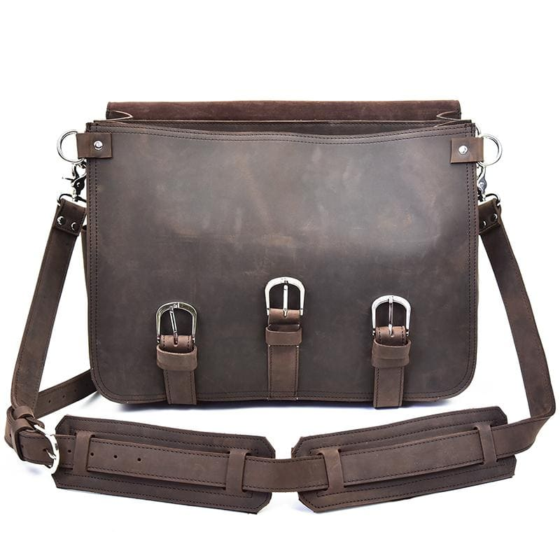 a brown leather bag with straps