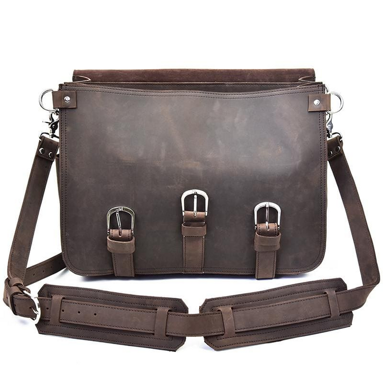 a brown leather bag with straps