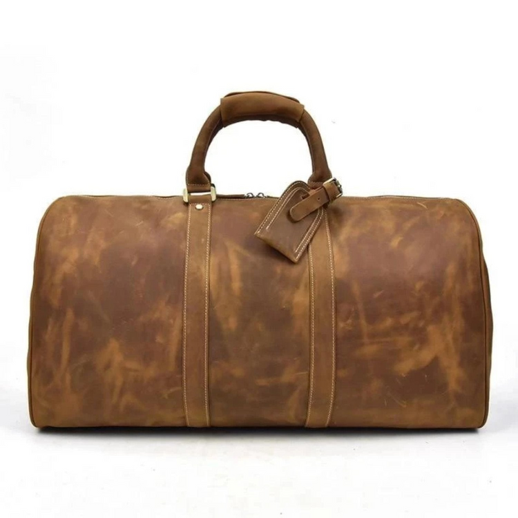 a brown leather bag with a handle