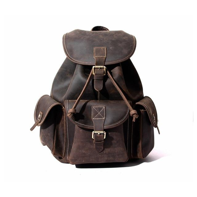a brown backpack with pockets