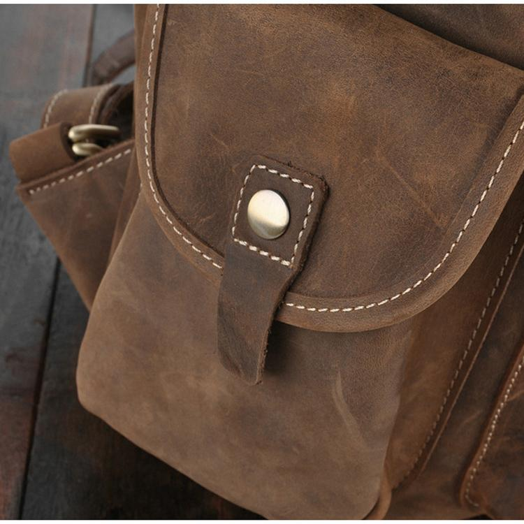 a close up of a brown leather bag
