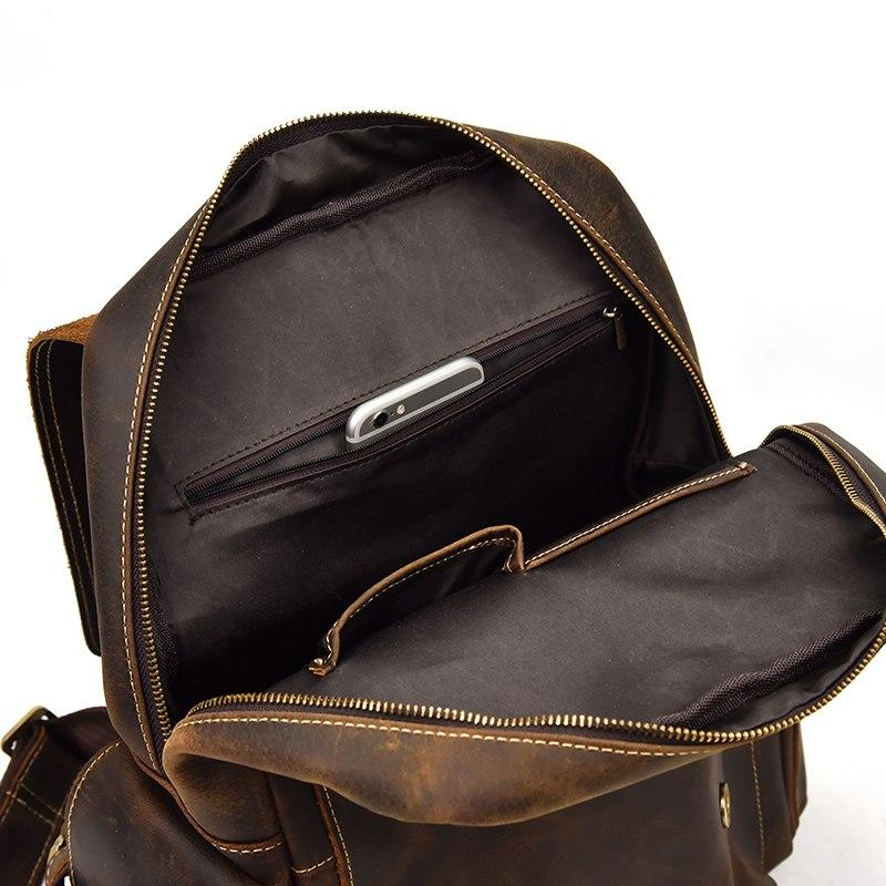 a brown backpack with a pocket open