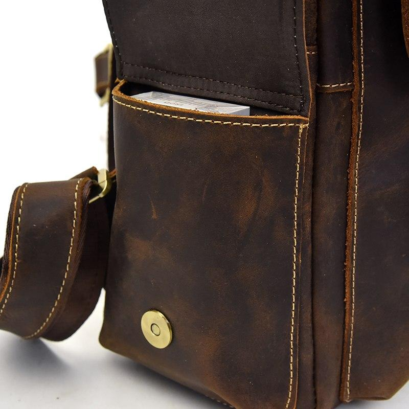 a brown leather bag with a pocket