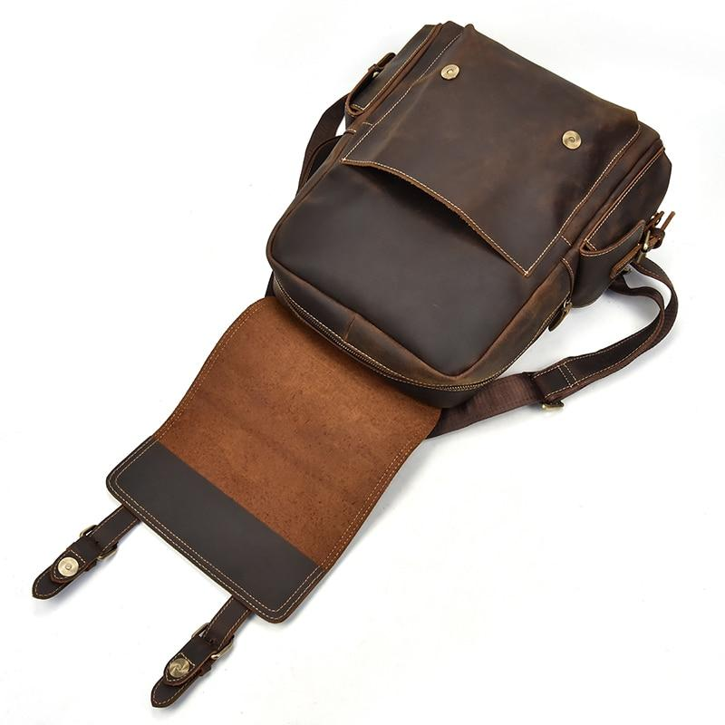 a brown leather bag with a strap