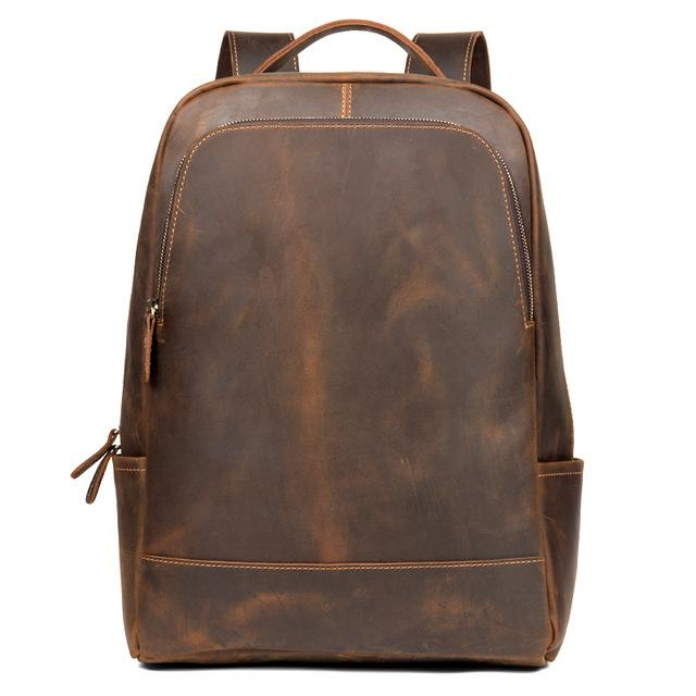 a brown backpack with a zipper