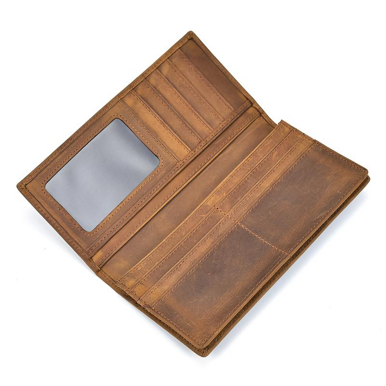 a brown leather wallet with a rectangular object inside