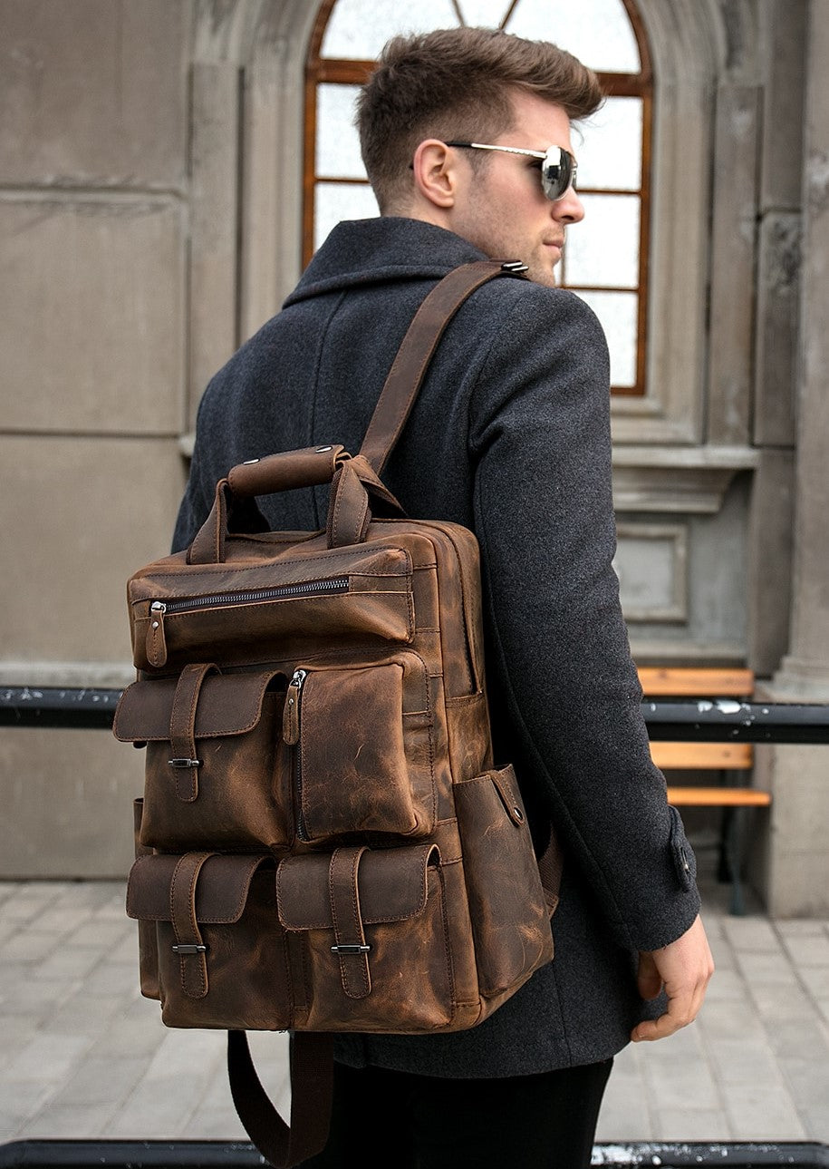 a man wearing sunglasses and a backpack