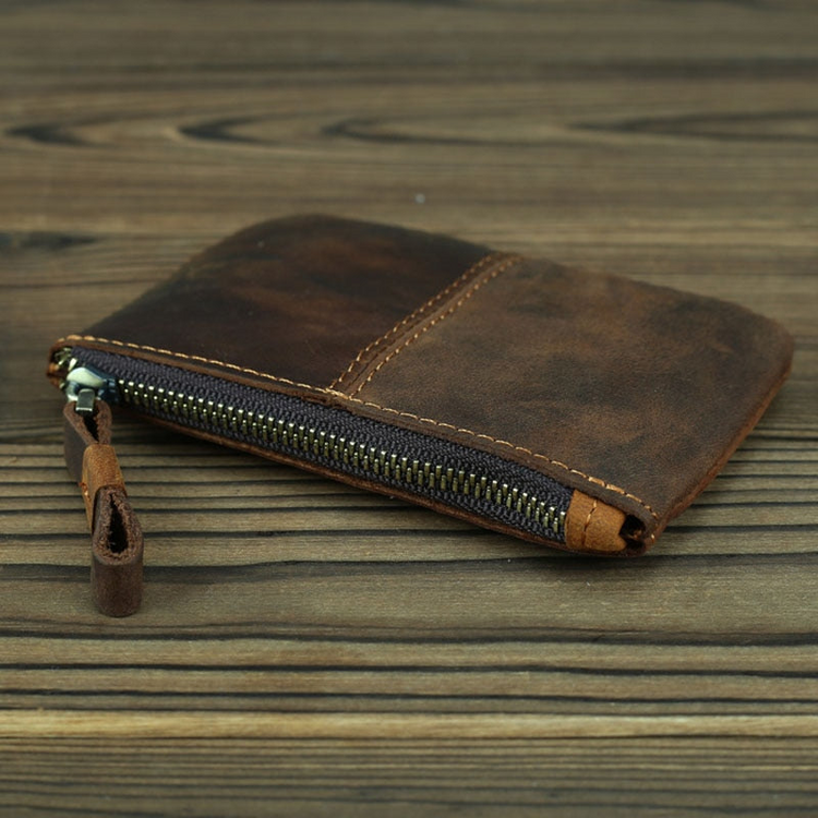 a brown wallet with a zipper