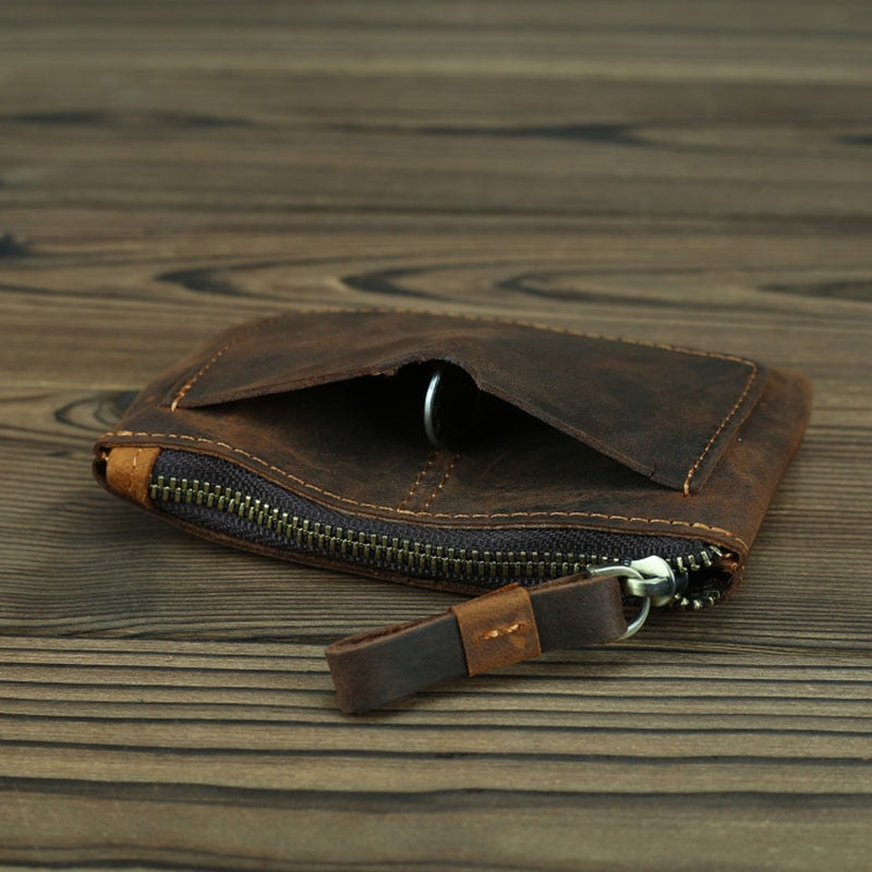 a brown wallet with a zipper