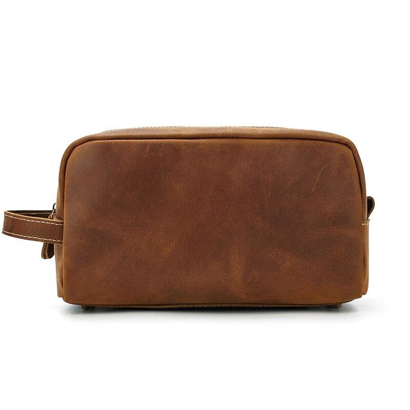 a brown leather bag with a handle