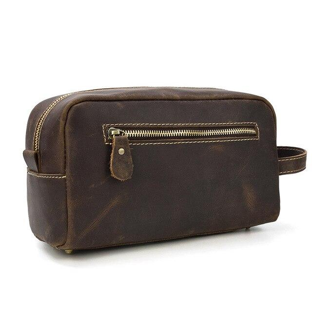 a brown leather bag with a handle