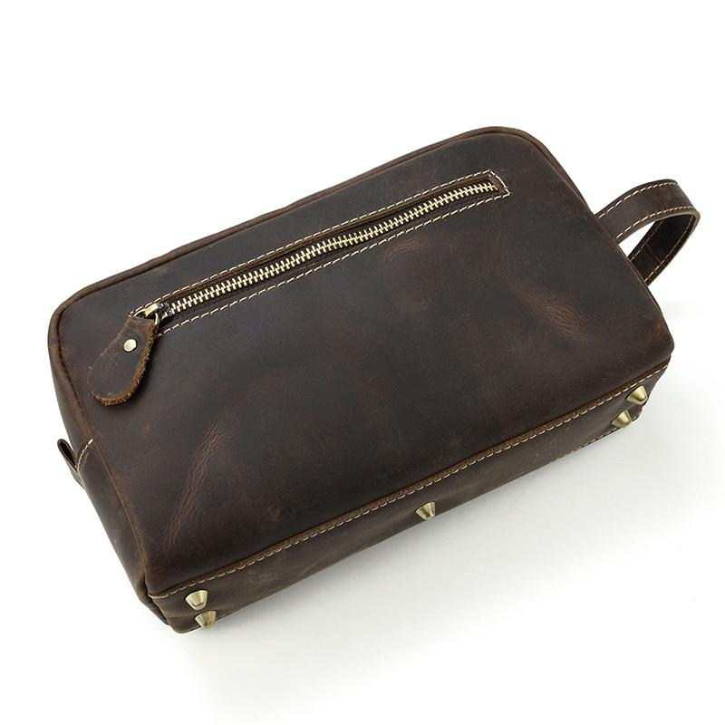 a brown leather bag with a zipper