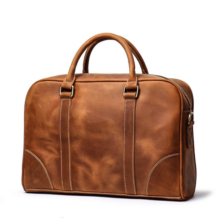 a brown leather bag with a handle