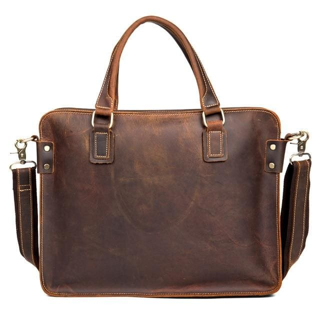 a brown leather bag with straps