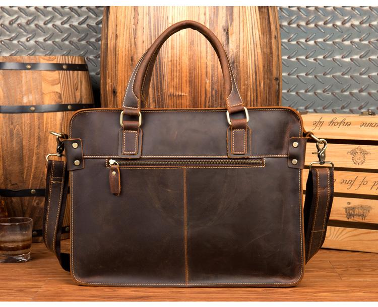 a brown leather bag with a strap