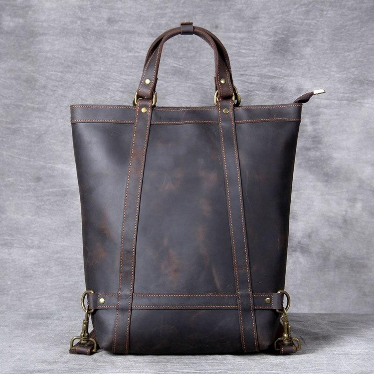 a brown leather bag with straps
