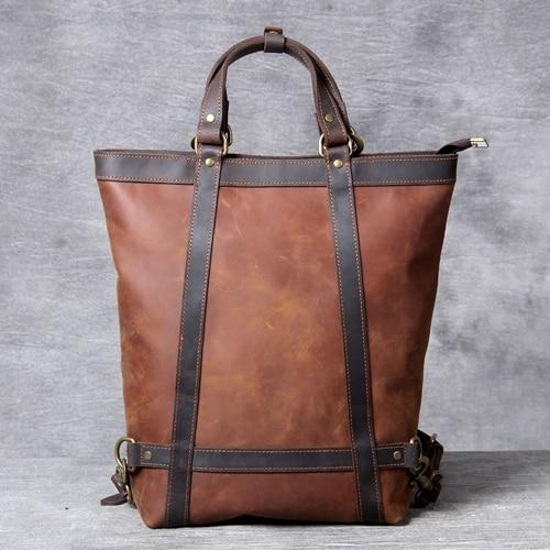 a brown leather bag with straps