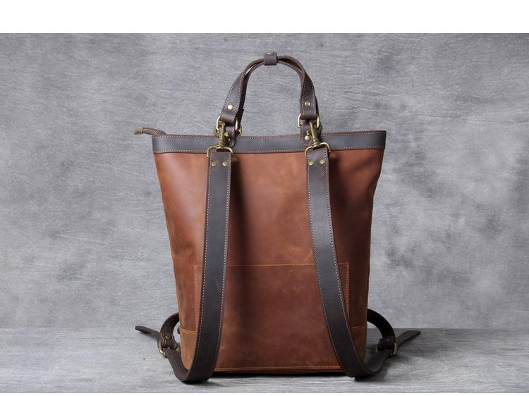 a brown leather bag with straps