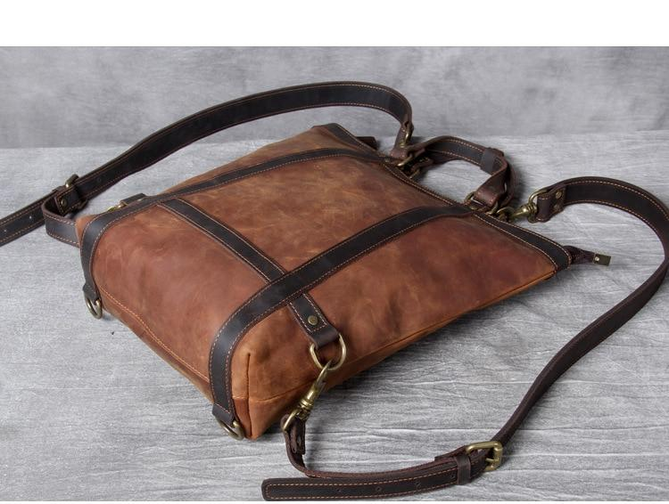 a brown leather bag with straps
